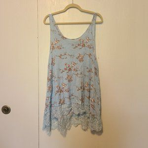 oneA floral pattern lace hem swing tank